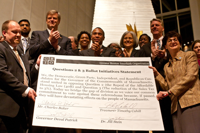 GBIO consensus: Charlie Baker, Gov. Deval Patrick, Dr. Jill Stein and Treasurer Tim Cahill stand united against questions 2 & 3. Photo by Erik Jacobs 