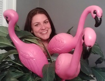 Mayor Katie Hurley with a few of her trademark flamingoes