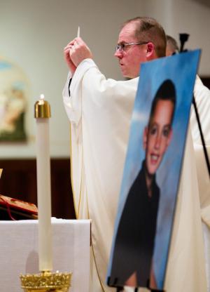 Mass celebrates life of Martin Richard: Fr. Sean Connor led the Mass at St. Ann Church in Neponset. Photo by Gregory L. Tracy/Pilot Media Group