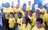 A choir of neighborhood residents performs for the crowd prior to the groundbreaking of the new Kroc Community Center on Dudley Street.