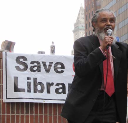 Rep. Byron Rushing: Speaking at a Save Our Libraries rally on City Hall plaza in June. Photo courtesy Dan Currie.