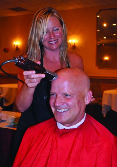 A Wiffle for Tommy: Charlie Maneikis received his wiffle cut from Heather Flynn. Photo by Bill Forry