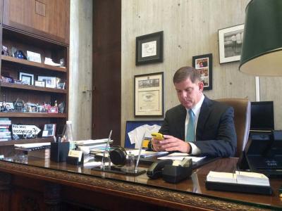 Mayor Martin Walsh sits at his desk at City Hall after speaking to the Reporter on Tuesday afternoon. Lauren Dezenski photo