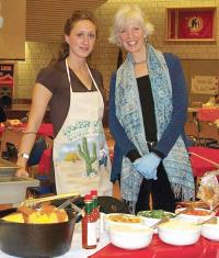 Claire Hughes, right, and friend at last year’s Cookoff won by Lower Mills Civic.