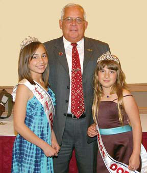 Dot Day 2010: Parade Chief Marshall Joe Zinck with Young Miss Dorchester Sophie Pacitti Philips, left, and Michelle Levinger, this year’s Little Miss Dorchester.