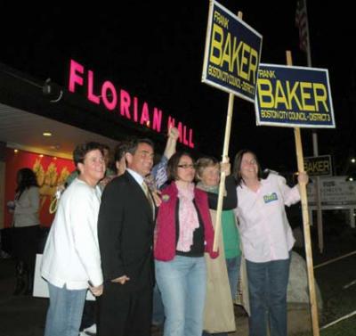Councillor-elect: Frank Baker and his wife Today Baker posed for a photo with supporters outside Florian Hall shortly after the polls closed on Tuesday, Nov. 8. Photo by Pat Tarantino