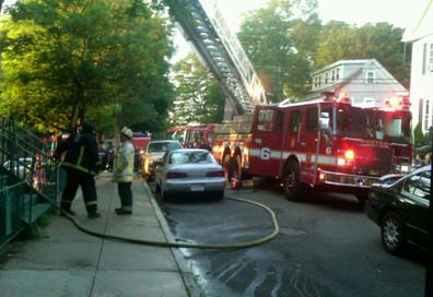 Butler Street apartment fire: The scene outside 68 Butler Street this morning. Photo by Ryan Whitcomb