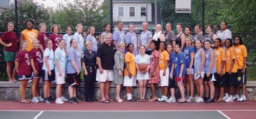 Competitors in Maureen Feeneyâ€™s Womenâ€™s Basketball League, which rules the court on Monday nights at Hemenway Park, smile for the camera along with members of Dorchesterâ€™s political delegation. City Councillors Steve Murphy and Maureen Feeney and State Re