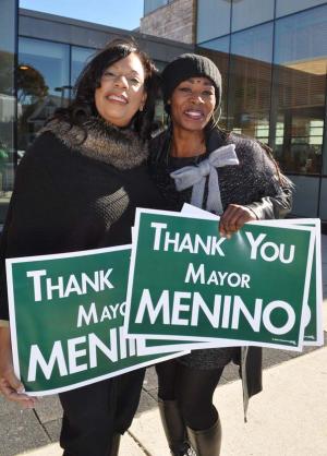 Deborah Smith-Pressley and Vanessa Wilson-Howard: Joined a stand-out to say farewell to mayor as his funeral procession passed on Blue Hill Avenue on Mon., Nov. 3. Photo by Bill Forry
