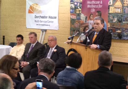Dot House celebration: Dorchester House CEO Joel Abrams addressed a crowd at the facility this morning. At right, (l-r) are Councillor Frank Baker, Senator Jack Hart, Mayor Tom Menino. Photo by Ed Forry