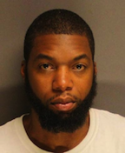 Henriquez: The 5th Suffolk state rep in a booking photo after his arrest on Sunday.