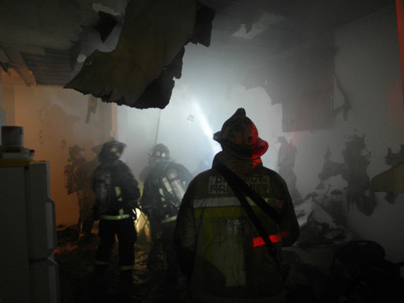 Firefighters inside Mather Street. Photo by BFD.