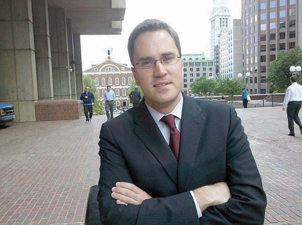 Justin Holmes, a veteran political hand from Ward 16, has become Mayor Tom Menino’s go-to constituent services man in City Hall. Photo by Mike Deehan