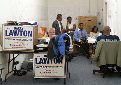 Lawton HQ on election night: The candidate, seated above center, monitored returns online. Photo by Pat Tarantino