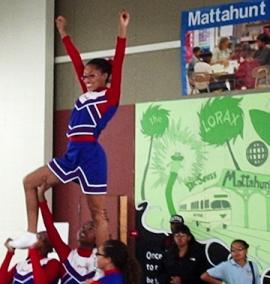 Mattahunt Center: Cheerleaders from Mattapan Pop Warner helped celebrate the center's re-opening last week. Photo by Alex Owens