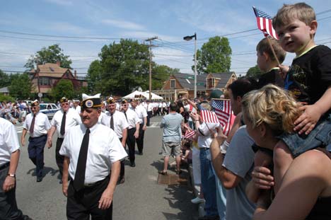 Memorial Day Parade: Members of the McKeon Post marched into Cedar Grove Cemetery during the 2006 parade. Photo by Bill Forry