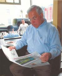 Mayor Menino reads the Reporter: Mayor Tom Menino gets his weekly dose of the Reporter at the Mud House, Neponset Ave., 2007. Photo courtesy Mayor's Office