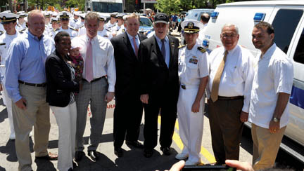 Dot Day 2011: (l-r) Council president Steve Murphy, Rep. Linda Dorcena Forry (with daughter Madeline), US Sen. Scott Brown, Sen. Jack Hart, Chief Marshal John Connor, Patrick Kulakowski, Commanding Officer of the USS Carr, Mayor Tom Menino, City Councillor Felix Arroyo