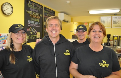 PS Gourmet Coffee: Owner Jim Fallon, second from left, is shown with employees Katelyn Keeley, left, Lauren Karski and Adams Corner store manager Debbie Shaughnessy, far right. Photo by Bill Forry
