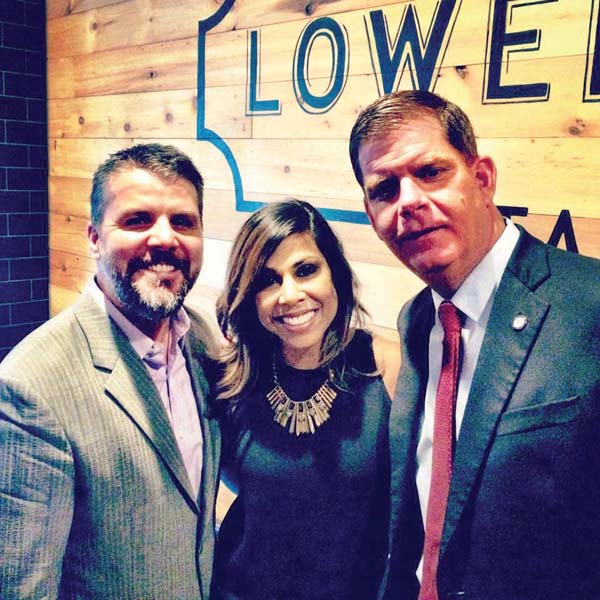 Welcome to the neighborhood: Lower Mills Tavern owner Brian O’Donnell and his wife, designer Taniya Nayak, are shown with Mayor Martin Walsh, who visited the new restaurant for a private event last week. The eatery opens to the public on May 31. Photo courtesy Lower Mills Tavern