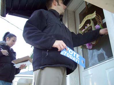 Door knockers remind people to vote and even offer rides to polling places