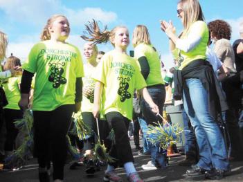 “Dorchester Strong” — A parade of local Irish dance schools preceded performances at Sunday’s Irish Heritage Festival. The indoor and outdoor event drew thousands to Florian Hall and the McKeon Post for a day or music, food and Irish culture. 	Photo by Sean Smith