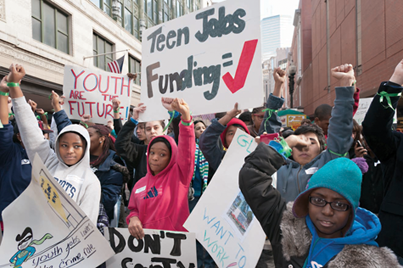 Rally for jobs: More than 1,200 students from in and around Boston gathered downtown last Thursday to march with the Youth Jobs Coalition, a Dorchester-based organization. Photo by Travis Watson