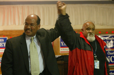 A victorious Charles Yancey: Left, celebrates his election night win with fellow councillor Chuck Turner at the Unity Sports and Cultural Center.