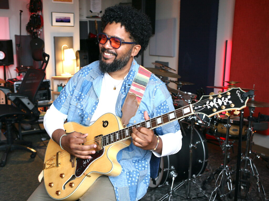 Ray Liriano with guitar