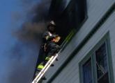 Firefighter at 21 E. Cottage St.