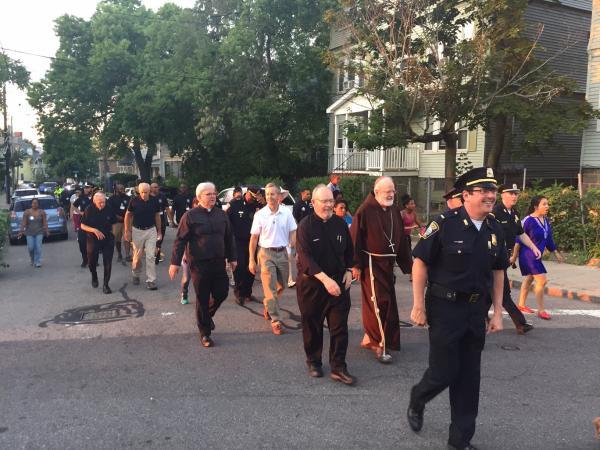 Cardinal Sean O’Malley was among the 200 people who participated in an anti-violence walk through the streets of Bowdoin-Geneva on Tuesday evening.