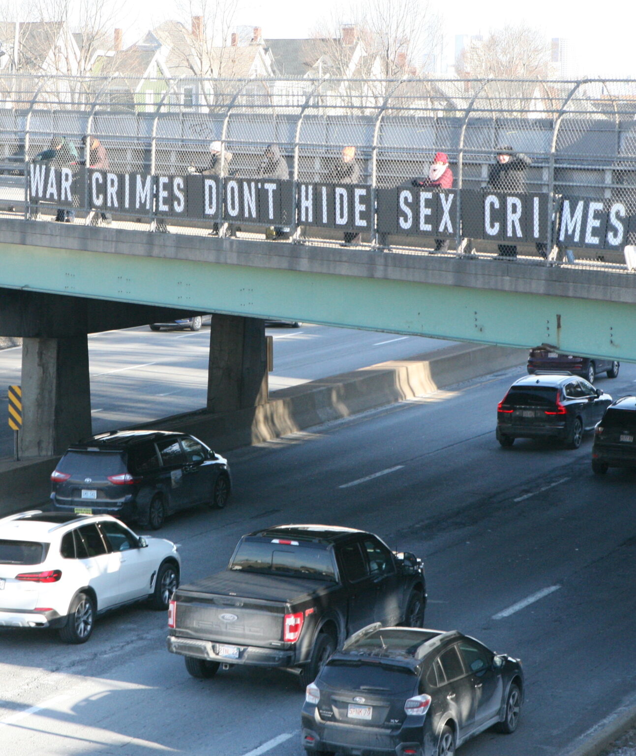 Activists bring anti-war message to Savin Hill bridge - Dorchester Reporter