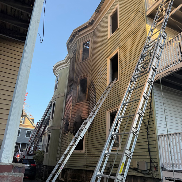 Ladders on the side of 24 Kerwin after fire; photo by BFD